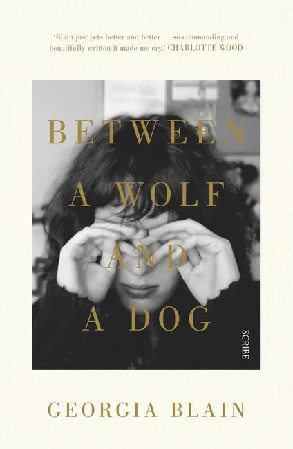 Between a Wolf and a Dog - Paperback