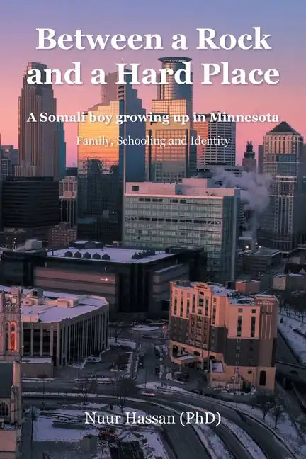 Between a Rock and a Hard Place: A Somali boy growing up in Minnesota: Family, Schooling and Identity - Paperback